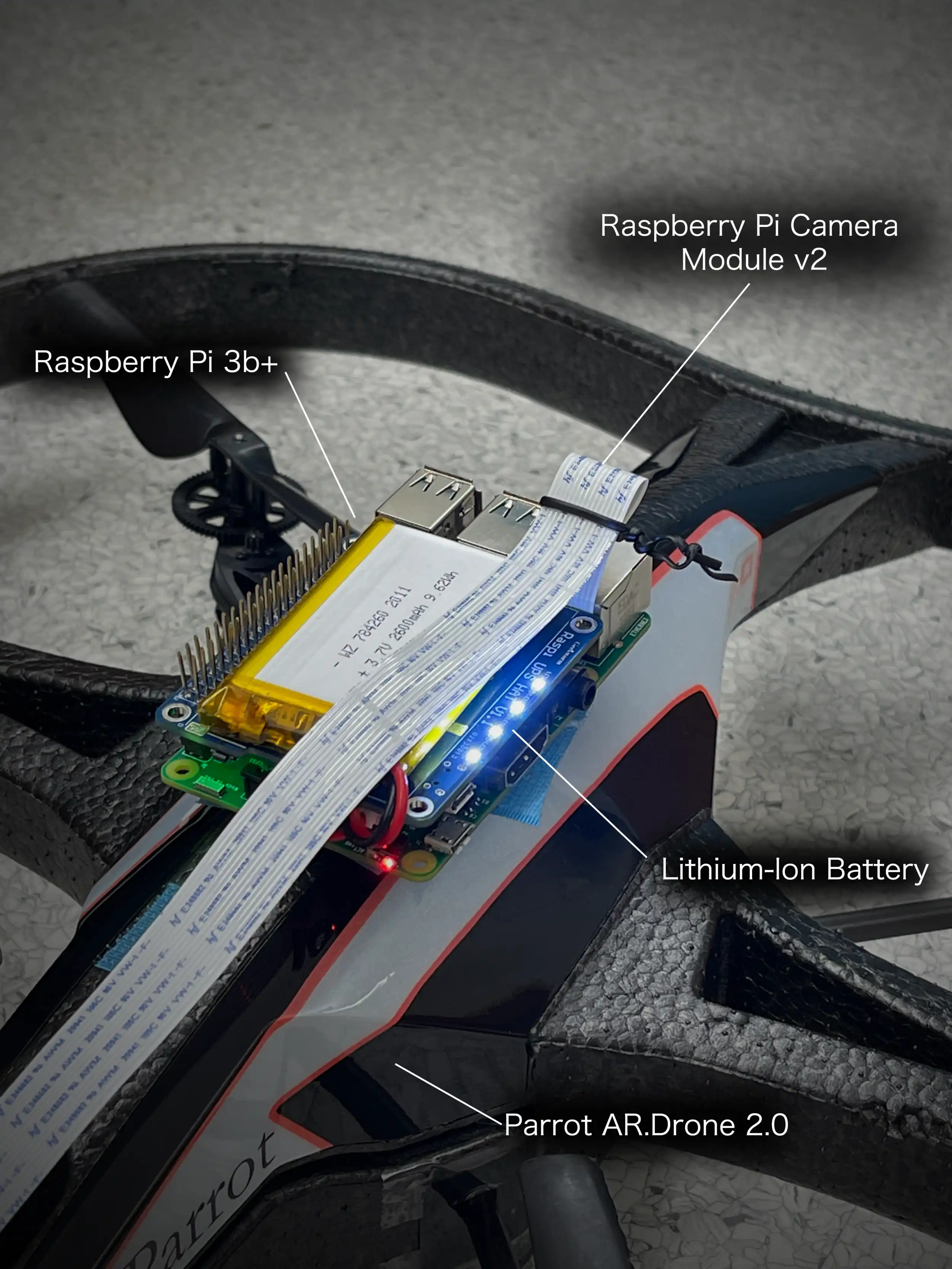 Parrot AR.Drone 2.0 with Raspberry Pi 3B+, Raspberry Pi Camera Module v2, and Lithium Ion Batter